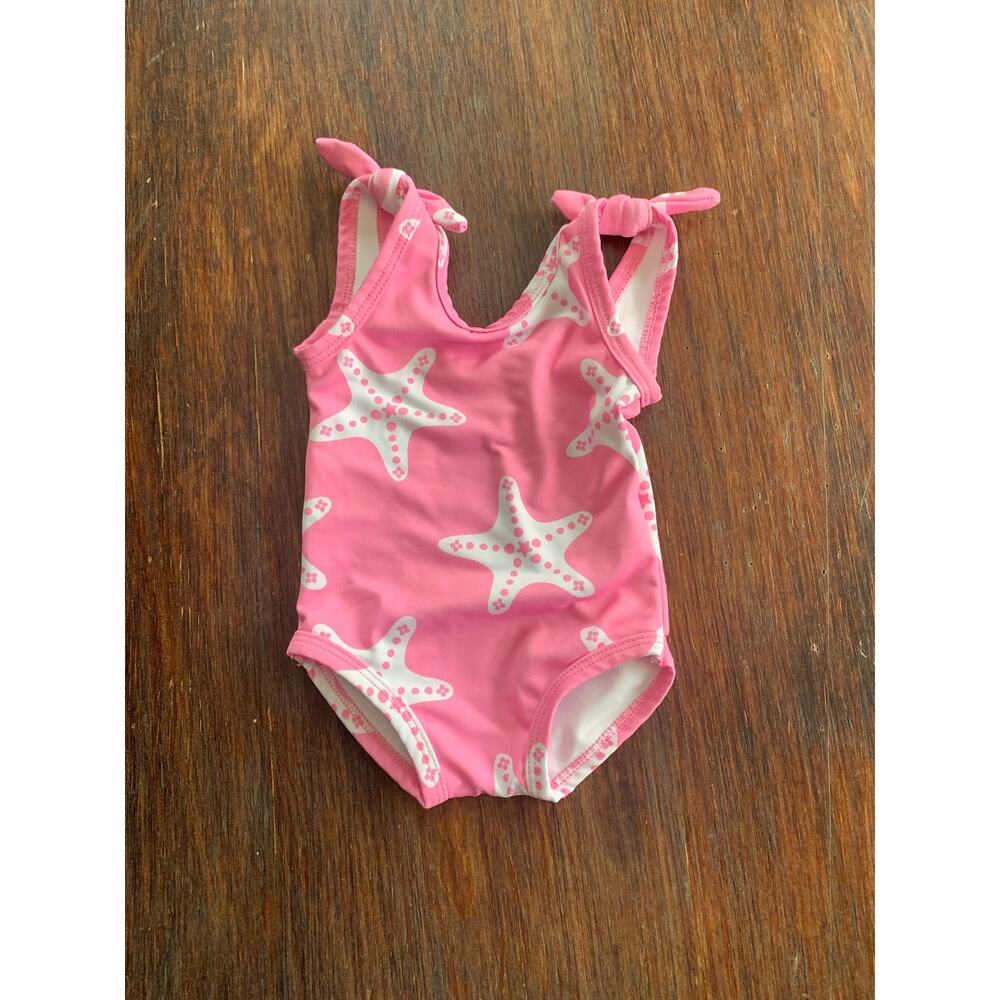 monica and andy pink swimsuit